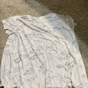 White and blue top with nature designs